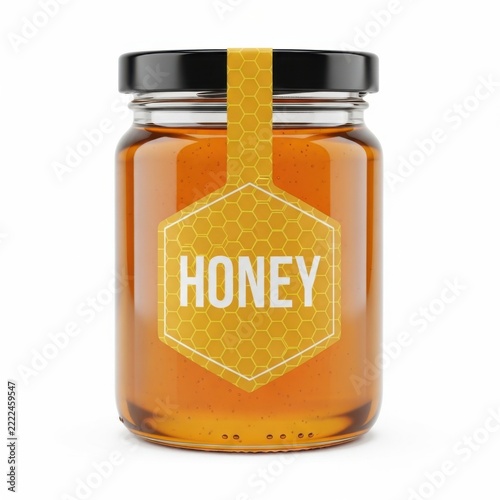 A jar of honey with a decorative honeycomb label and ribbon closure