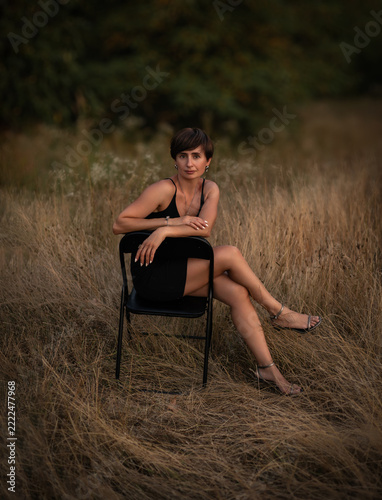 Beautiful Woman in a Rural Autumn Landscape at Sunset, Golden Hour Portrait and Countryside Lifestyle