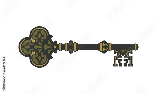 Antique ornate brass skeleton key with intricate vintage filigree metal engravings.