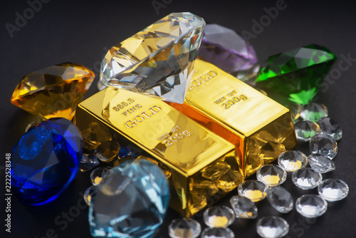 A pile of gold bars and diamonds