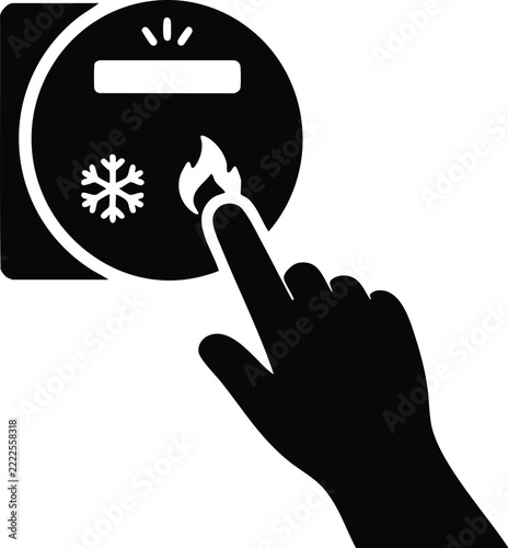 Hand pressing a climate control button for heating