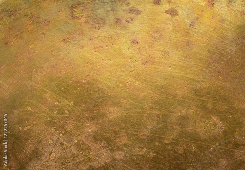 Fotografie Close-up of aged brass with rich patina, oxidation, scratches, stains, and traces of time