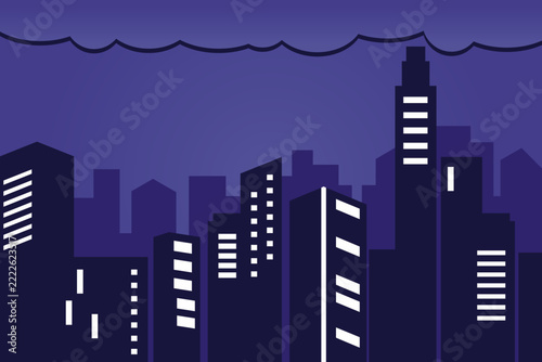 Vector silhouette of a city at night with dark clouds
