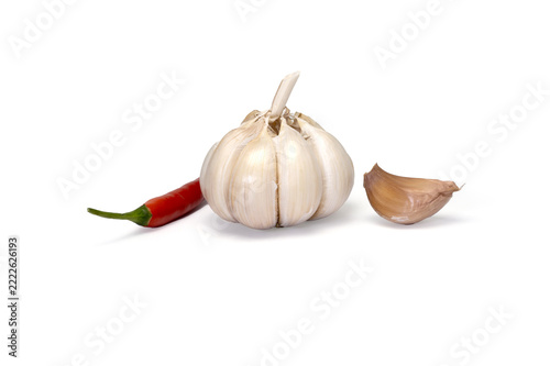 Garlic bulb red chili and unpeeled clove arranged