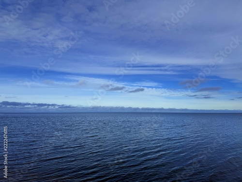 blue calm sea horizon, blue sea and blue sky, natural seascape background