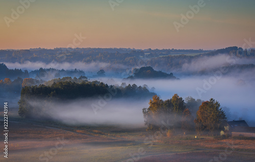 Fields covered in fog in Kernave, Lithuania