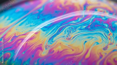 Abstract iridescent thin film background with smooth fluid gradients 