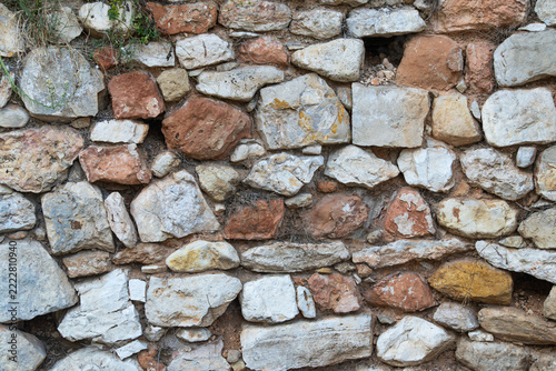 Old natural stone wall texture background