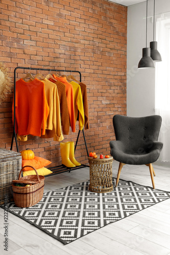Autumn home interior, cozy fall fashion and seasonal lifestyle with warm swea...