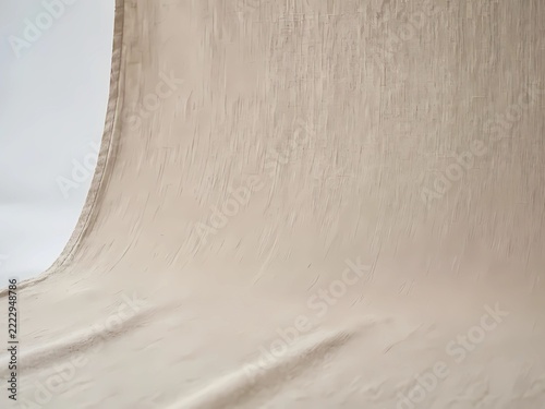 Minimalist Beige Fabric Studio Backdrop with Soft Curved Texture for Professional Product Photography and Elegant Background Display