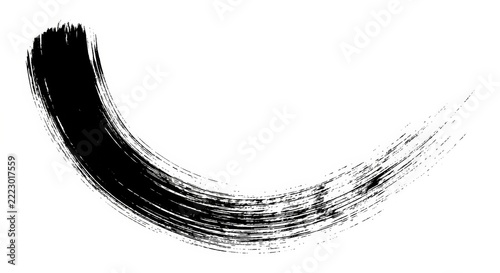 Curved black brush stroke with a fading tail