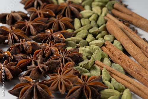 Mulled wine spice cluster with star anise, cardamom pods, and cinnamon sticks