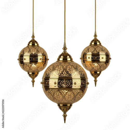 Three ornate copper holiday baubles hanging