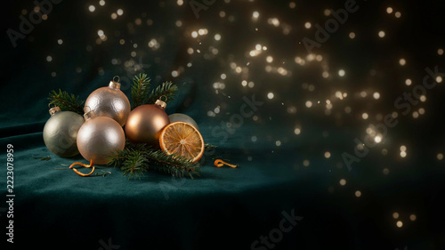 Premium Frosted Glass Christmas Ornaments in Champagne, Sage Green and Amber on Emerald Velvet with Spruce Branches and Warm Festive Bokeh