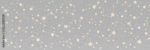 field of gold stars, tiny glitter dots and soft luminous accents arranged with festive style