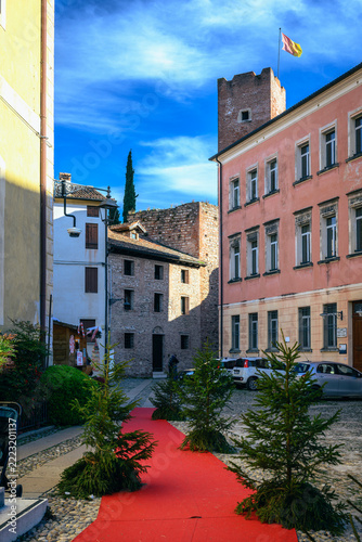 Strolling through the historic streets of Bassano del Grappa. The famous Ponte degli Alpini and its historic streets. Christmas atmosphere.