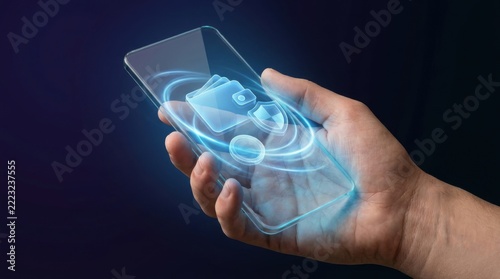 Hand Holding Transparent Futuristic Smartphone with Hologram Data