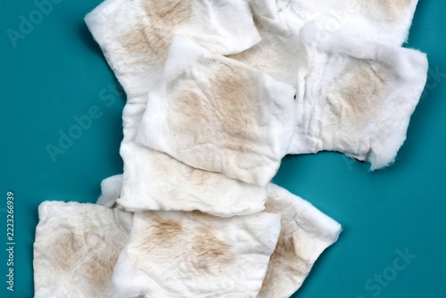 Dirty cotton pads after removing facial makeup