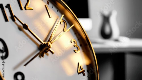 Golden analog clock face showing the final minutes