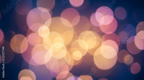 Abstract background with soft glowing light orbs and dreamy bokeh circles effect