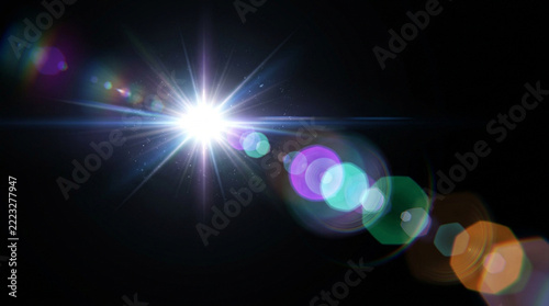 Cinematic anamorphic lens flare with vibrant light streaks on a black background