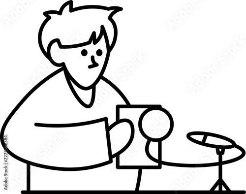 Podcaster recording audio content with microphone and script in