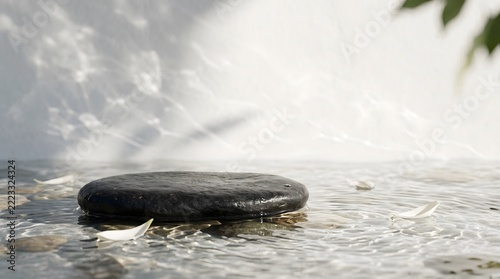 Natural black stone podium in water with light reflections for cosmetic mockup