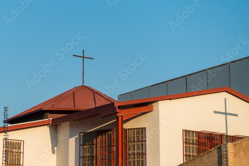 Obraz na plátně Modern Protestant Church with Cross on Building Facade