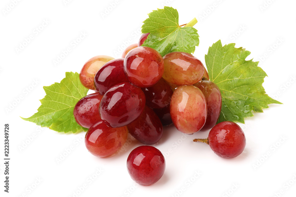 Fototapeta premium Fresh ripe grapes and green leaves isolated on white