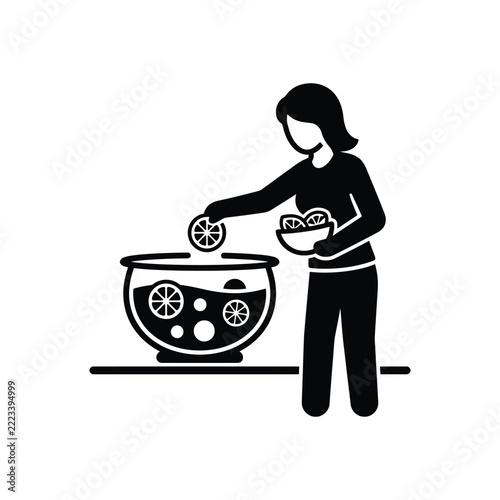 Woman Preparing Refreshing Fruit Punch for a Party.