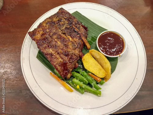 Obraz na plátně Grilled Barbecue Pork Ribs on Plate