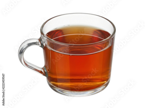 A clear glass mug filled with amber-colored tea on transparent background
