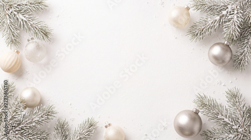 A cold frosty Christmas background, with decoration and pine branches.