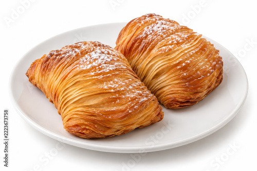 Delicious Sfogliatella Riccia Pastries on a White Plate for Culinary Delight
