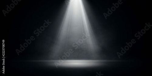Single stage light beam cutting through thick dark moody smoke with effect spotlight darkness illumination performance atmosphere dramatic background ethereal showcase
