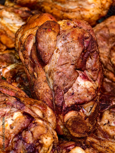 Fotografie Prepared pork knuckle with its distinctive skin and substantial bone rests on a