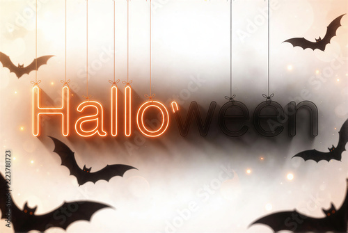 Dramatic glowing Halloween hanging letters with magical bats