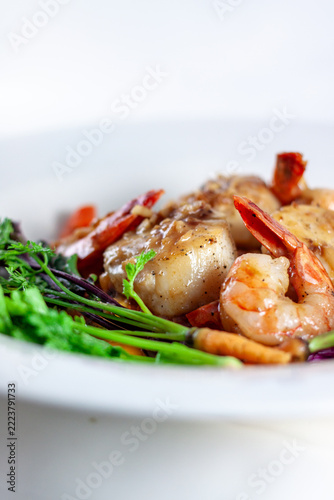 Gourmet Seared Sea Scallops and Shrimp Platter with Baby Carrots and Greens