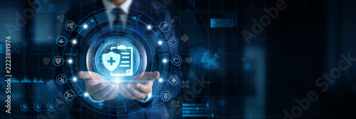 Insurance Specialist holding and controlling Medical Insurance network interface with digital and healthcare data. Policy management, coverage planning, claims processing, financial protection