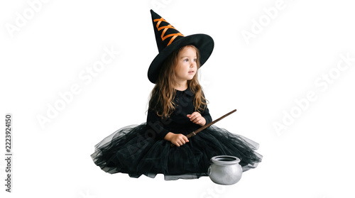 Sitting Little Girl in Witch Costume Holding Wand and Cauldron   JPG