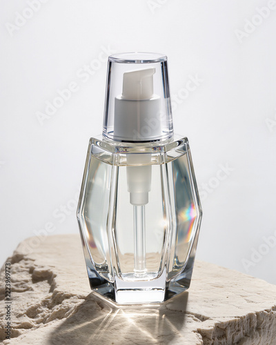 Minimalist Clear Glass Perfume Bottle on a Clean White Background