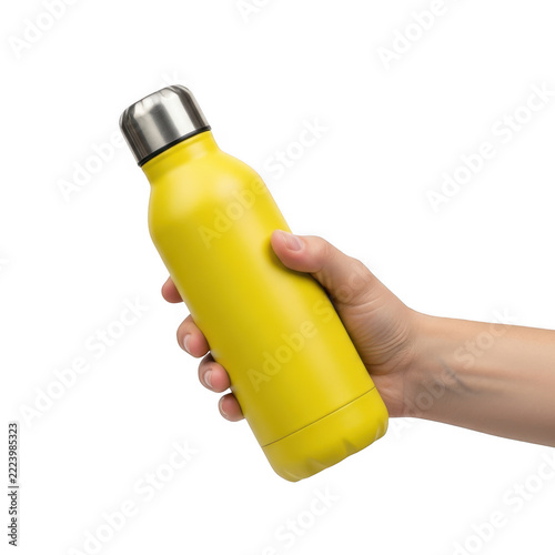 A hand holding a bright yellow reusable metal water bottle for daily hydration isolated on transparent background