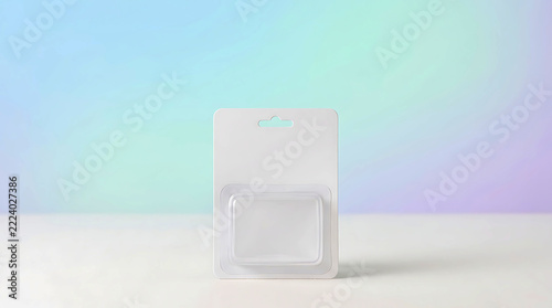 Blank blister pack packaging on a pastel gradient background