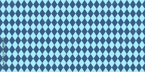 Seamless argyle pattern with blue and light blue diamond shapes. Geometric background for fabric, wallpaper, and wrapping paper.