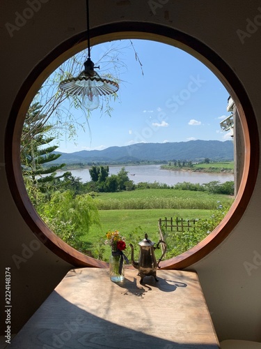 circle window view at riverside background