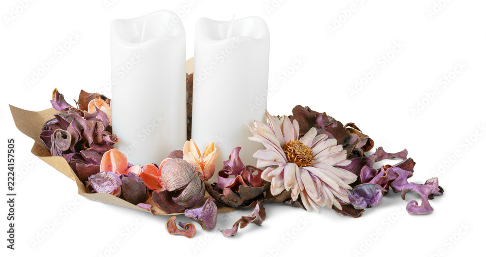 Fototapeta premium Decorative arrangement with white candles and dried flower petals on a simple background