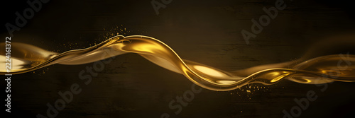 Liquid gold wave splash with glossy reflection on dark background
