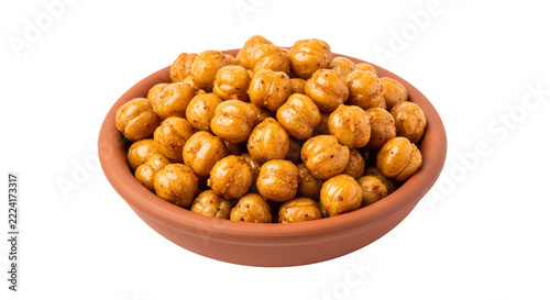 Roasted chickpeas in a small clay bowl presented on a clean transparent background for healthy vegan snack food photography
