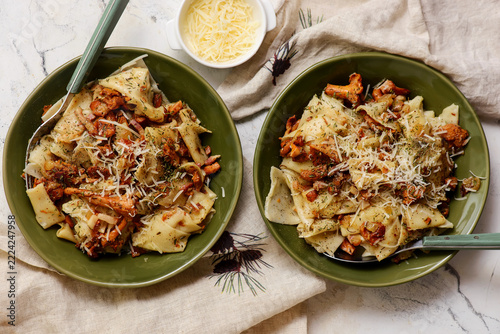 Homemade pasta with sauteed chanterelles, bacon, and Parmesan