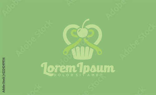 Stylized green vector logo of a cupcake with a cherry